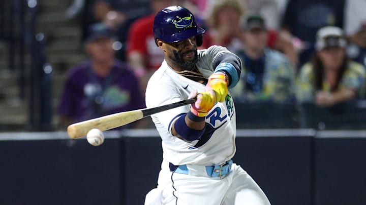 Sep 20, 2025; Tampa, Florida, USA; Tampa Bay Rays first baseman Yandy Diaz (2) hits an rbi single against the Boston Red Sox in the seventh inning at George M. Steinbrenner Field. 
