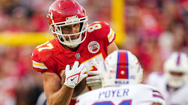 Oct 16, 2022; Kansas City, Missouri, USA; Kansas City Chiefs tight end Travis Kelce (87) catches a pass as Buffalo Bills safety Jordan Poyer (21) defends during the second half at GEHA Field at Arrowhead Stadium. Mandatory Credit: Jay Biggerstaff-Imagn Images Oct 16, 2022; Kansas City, Missouri, USA; Kansas City Chiefs tight end Travis Kelce (87) catches a pass as Buffalo Bills safety Jordan Poyer (21) defends during the second half at GEHA Field at Arrowhead Stadium. Mandatory Credit: Jay Biggerstaff-Imagn Images