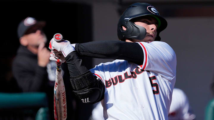 GeorgiaÕs Christian Adams (5) watches the ball fly during an NCAA baseball game against UIC in Athens, Ga., on Friday, Feb. 21, 2025.
