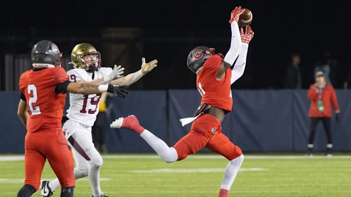 Toledo Central Catholic   s Victor Singleton Jr. intercepts a pass intended Bishop Watterson   s Cal Mangini ending the Eagles' final drive during the Division III state final Friday, Dec. 1, 2023, in Canton.