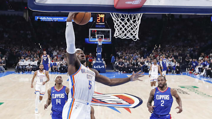 Feb 22, 2024; Oklahoma City, Oklahoma, USA; Oklahoma City Thunder guard Luguentz Dort (5) goes to