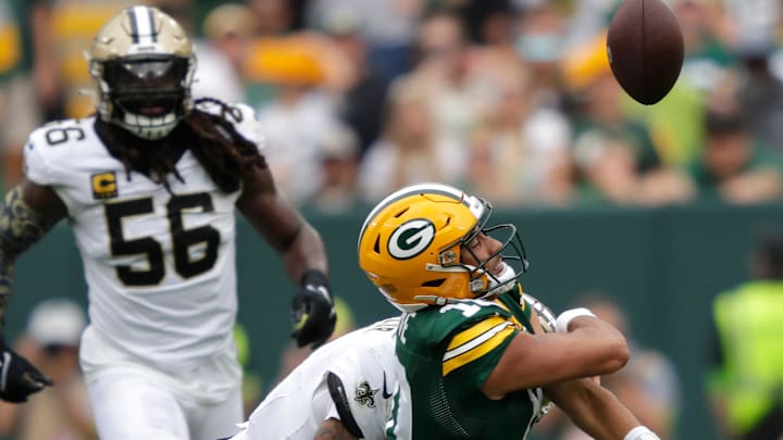 Green Bay Packers quarterback Jordan Love (10) is sacked by New Orleans Saints cornerback Alontae Taylor (1) in the second quarter during their football game Sunday, September 24, 2023, at Lambeau Field in Green Bay, Wis.