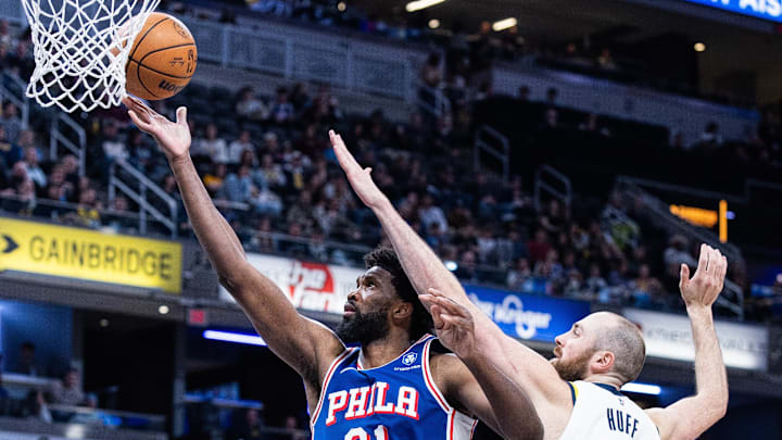 Feb 24, 2026; Indianapolis, Indiana, USA;  Philadelphia 76ers center/forward Joel Embiid (21) shoots the ball while Indiana Pacers center Jay Huff (32) defends in the second half at Gainbridge Fieldhouse. Mandatory Credit: Trevor Ruszkowski-Imagn Images