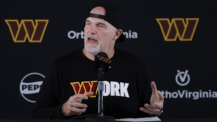 Jul 25, 2024; Ashburn, VA, USA; Washington Commanders head coach Dan Quinn speaks with the media on day two of training camp at OrthoVirginia Training Center at Commanders Park. Mandatory Credit: Geoff Burke-USA TODAY Sports