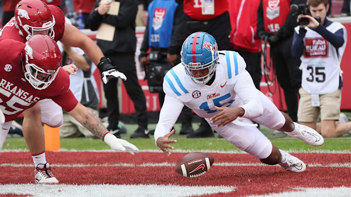 Nov 2, 2024; Fayetteville, Arkansas, USA; Ole Miss Rebels defensive end Jared Ivey (15) falls on a loose ball in the end zone for a touchdown in the first quarter against the Arkansas Razorbacks at Donald W. Reynolds Razorback Stadium. Mandatory Credit: Nelson Chenault-Imagn Images