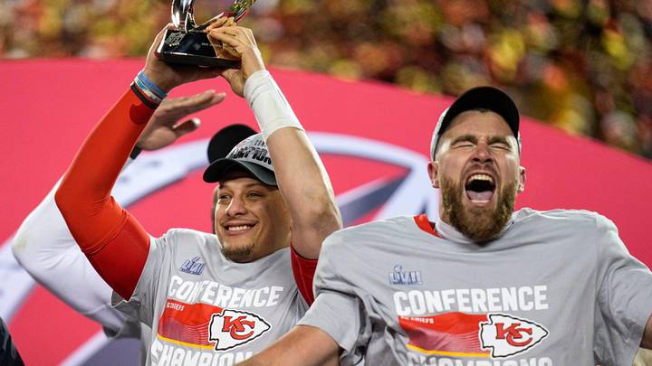 Jan. 29, 2023: Patrick Mahomes raises the Lamar Hunt Trophy while Travis Kelce celebrates after the Kansas City Chiefs' 23-20 win over the Cincinnati Bengals in the AFC championship game at Arrowhead Stadium.