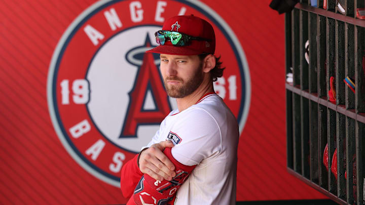 Sep 29, 2024; Anaheim, California, USA;  Los Angeles Angels left fielder Taylor Ward (3) stands in a dugout during the ninth inning against the Texas Rangers at Angel Stadium.