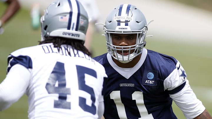 Dallas Cowboys linebacker Micah Parsons goes through drills during voluntary Organized Team Activities at The Star.