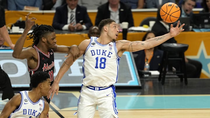 Duke Blue Devils forward Mason Gillis (18) grabs a rebound against the Houston Cougars 