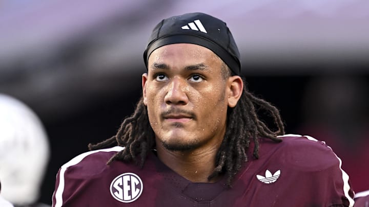 Oct 11, 2025; College Station, Texas, USA; Texas A&M Aggies defensive end T.J. Searcy (18) looks on prior to the game against the Florida Gators at Kyle Field. Mandatory Credit: Maria Lysaker-Imagn Images 