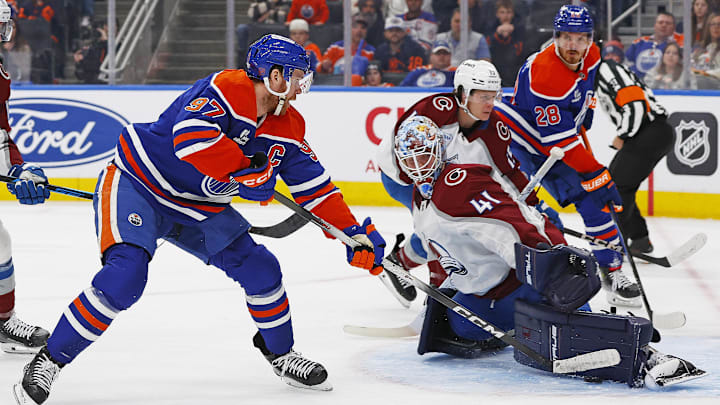 Nov 8, 2025; Edmonton, Alberta, CAN; Colorado Avalanche goaltender Scott Wedgewood (41) makes a save on Edmonton Oilers forward Connor McDavid (97) during the third period at Rogers Place. Mandatory Credit: Perry Nelson-Imagn Images