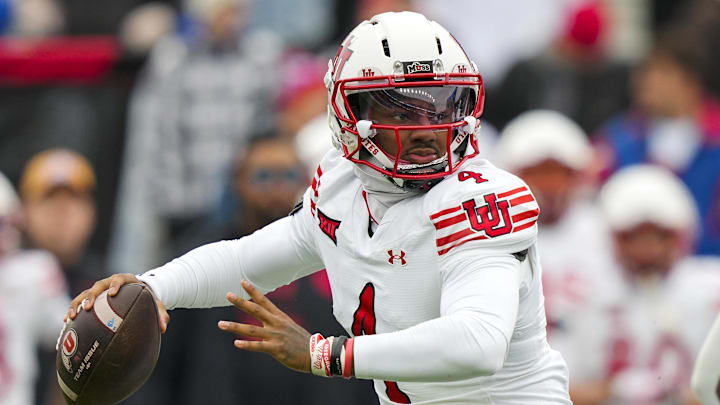 Utah Utes quarterback Devon Dampier (4) recorded 29 total touchdowns and nearly 2,900 total yards of offense in 11 regular season starts.