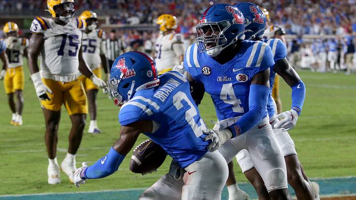 Mississippi Rebels linebacker Suntarine Perkins reacts with cornerback Jaylon Braxton after an interception during the fourth quarter against the LSU Tigers at Vaught-Hemingway Stadium. Mandatory Credit: Petre Thomas-Imagn Images Mississippi Rebels linebacker Suntarine Perkins reacts with cornerback Jaylon Braxton after an interception during the fourth quarter against the LSU Tigers at Vaught-Hemingway Stadium. Mandatory Credit: Petre Thomas-Imagn Images
