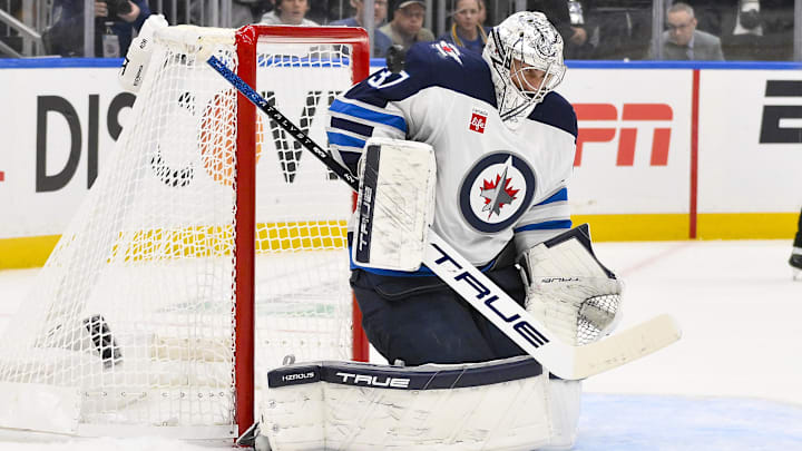 Apr 24, 2025; St. Louis, Missouri, USA; Winnipeg Jets goaltender Connor Hellebuyck (37) defends the net against the St. Louis Blues during the second period in game three of the first round of the 2025 Stanley Cup Playoffs at Enterprise Center. Mandatory Credit: Jeff Curry-Imagn Images