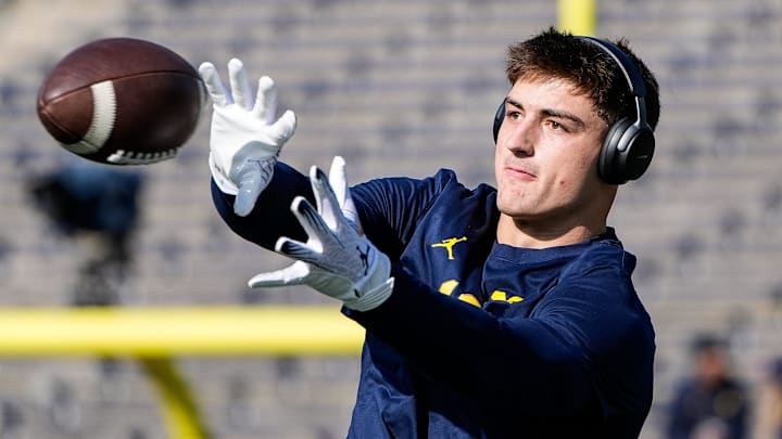 Michigan tight end Colston Loveland (18) warms up before the Oregon game at Michigan Stadium in Ann Arbor on Saturday, Nov. 2, 2024.