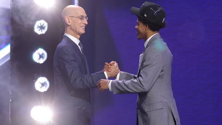 Jun 23, 2026; New York, NY, USA; NBA commissioner Adam Silver greets the eighteenth pick in the 2026 NBA draft, Texas Tech guard Christian Anderson Jr. after he was selected by the Charlotte Hornets at Barclays Center. Mandatory Credit: Brad Penner-Imagn Images