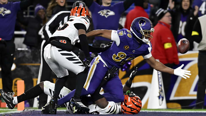 Nov 27, 2025; Baltimore, Maryland, USA; Baltimore Ravens tight end Isaiah Likely (80) attempts to make a catch against the Cincinnati Bengals during the first half at M&T Bank Stadium. Mandatory Credit: Tommy Gilligan-Imagn Images