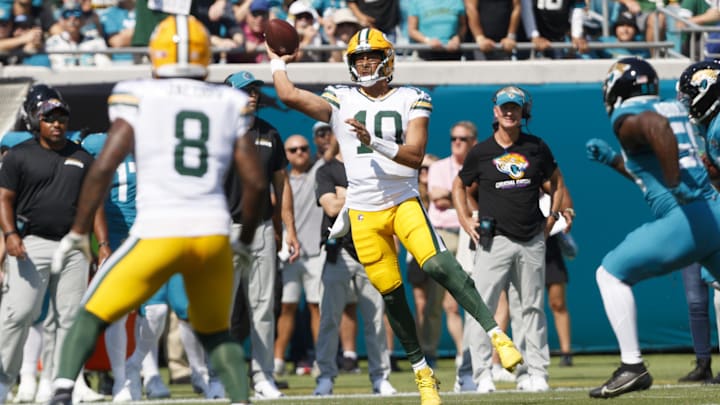 Oct 27, 2024; Jacksonville, Florida, USA; Green Bay Packers quarterback Jordan Love (10) throws a pass to running back Josh Jacobs (8) against the Jacksonville Jaguars during the first quarter at EverBank Stadium. Mandatory Credit: Morgan Tencza-Imagn Images Oct 27, 2024; Jacksonville, Florida, USA; Green Bay Packers quarterback Jordan Love (10) throws a pass to running back Josh Jacobs (8) against the Jacksonville Jaguars during the first quarter at EverBank Stadium. Mandatory Credit: Morgan Tencza-Imagn Images