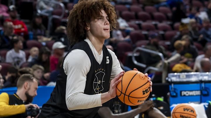 Mar 19, 2025; Wichita, KS, USA; Missouri Tigers guard T.O. Barrett (5) prepares to shoot the ball during a practice session at Intrust Bank Arena. Mandatory Credit: Nick Tre. Smith-Imagn Images Mar 19, 2025; Wichita, KS, USA; Missouri Tigers guard T.O. Barrett (5) prepares to shoot the ball during a practice session at Intrust Bank Arena. Mandatory Credit: Nick Tre. Smith-Imagn Images