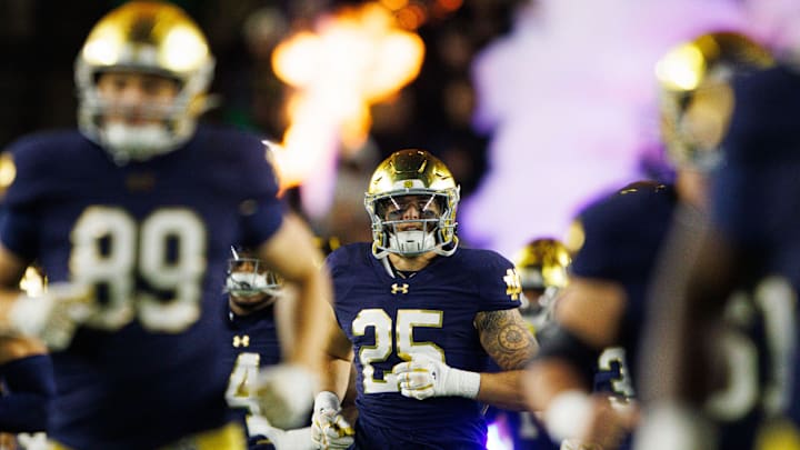 Notre Dame linebacker Preston Zinter (25) runs out onto the field with his team before a NCAA college football game against Florida State at Notre Dame Stadium on Saturday, Nov. 9, 2024, in South Bend. Notre Dame linebacker Preston Zinter (25) runs out onto the field with his team before a NCAA college football game against Florida State at Notre Dame Stadium on Saturday, Nov. 9, 2024, in South Bend.