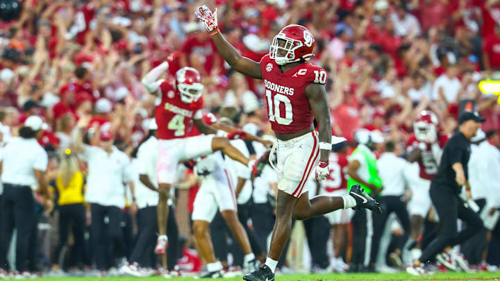 Oklahoma linebacker Kip Lewis celebrates after a play against Auburn. Oklahoma linebacker Kip Lewis celebrates after a play against Auburn.