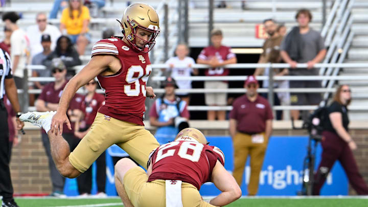 Aug 30, 2025; Chestnut Hill, Massachusetts, USA; Boston College Eagles place kicker Luca Lombardo (99) kicks an extra point against the Fordham Rams during the second half at Alumni Stadium. Mandatory Credit: Eric Canha-Imagn Images