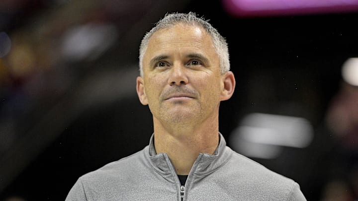 Mar 9, 2024; Tallahassee, Florida, USA; Florida State Seminoles head football coach Mike Norvell accepts the Bear Bryant coach of the Year award during a media timeout of a basketball game against the Miami Hurricanes at Donald L. Tucker Center. Mandatory Credit: Melina Myers-Imagn Images