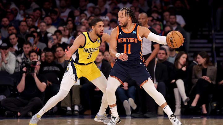 Feb 1, 2024; New York, New York, USA; New York Knicks guard Jalen Brunson (11) controls the ball against Indiana Pacers guard Tyrese Haliburton (0) during the first quarter at Madison Square Garden. Mandatory Credit: Brad Penner-Imagn Images