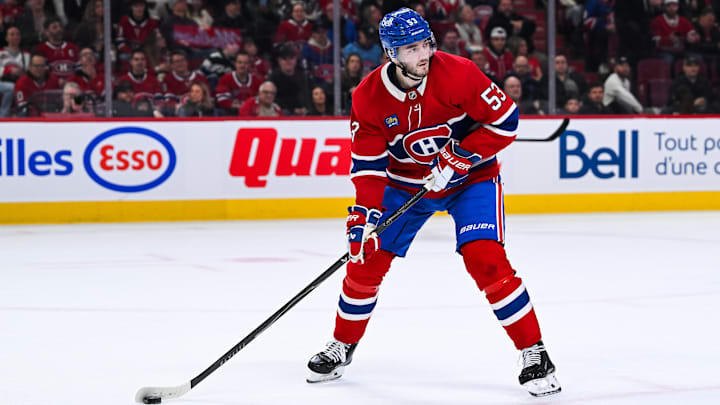 Mar 21, 2026; Montreal, Quebec, CAN; Montreal Canadiens defenseman Noah Dobson (53) plays the puck against the New York Islanders during the second period at Bell Centre. Mandatory Credit: David Kirouac-Imagn Images