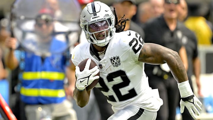 Sep 8, 2024; Inglewood, California, USA; Las Vegas Raiders running back Alexander Mattison (22) runs for a touchdown in the first half against the Los Angeles Chargers at SoFi Stadium. Mandatory Credit: Jayne Kamin-Oncea-Imagn Images