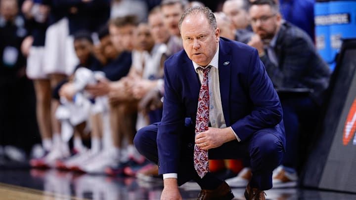 Mar 20, 2025; Denver, CO, USA; Wisconsin Badgers head coach Greg Gard looks on during the second half in the first round of the NCAA Tournament at Ball Arena.