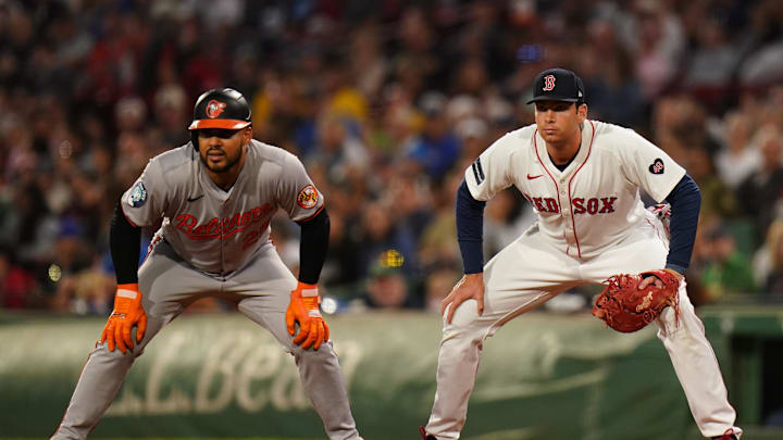 Sep 11, 2024; Boston, Massachusetts, USA; Baltimore Orioles designated hitter Anthony Santander (25) at first base with Boston Red Sox first baseman Triston Casas (36) in the first inning at Fenway Park. Mandatory Credit: David Butler II-Imagn Images