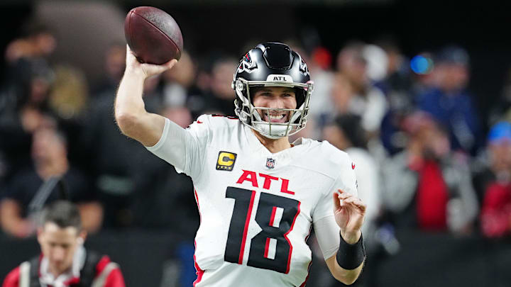 Dec 16, 2024; Paradise, Nevada, USA; Atlanta Falcons quarterback Kirk Cousins (18) warms up before a game against the Las Vegas Raiders at Allegiant Stadium. Mandatory Credit: Stephen R. Sylvanie-Imagn Images