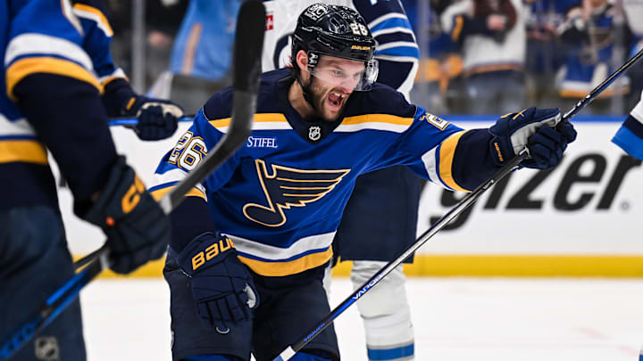 May 2, 2025; St. Louis, Missouri, USA; St. Louis Blues left wing Nathan Walker (26) reacts after scoring a goal against the Winnipeg Jets during the second period in game six of the first round of the 2025 Stanley Cup Playoffs at Enterprise Center. Mandatory Credit: Connor Hamilton-Imagn Images