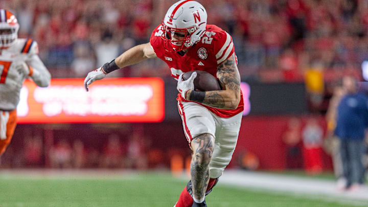 Nebraska tight end Thomas Fidone II runs after making a catch against Illinois.