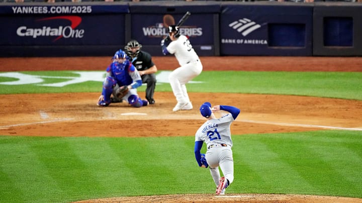 Oct 28, 2024; New York, New York, USA; Los Angeles Dodgers pitcher Walker Buehler (21) pitches during the fifth inning against the New York Yankees in game three of the 2024 MLB World Series at Yankee Stadium.