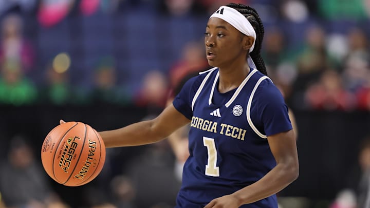 Mar 7, 2025; Greensboro, NC, USA;  Georgia Tech Yellow Jackets guard Chazadi Wright (1) dribbles the ball during the first quarter against NC State Wolfpack at First Horizon Coliseum. Mandatory Credit: Cory Knowlton-Imagn Images
