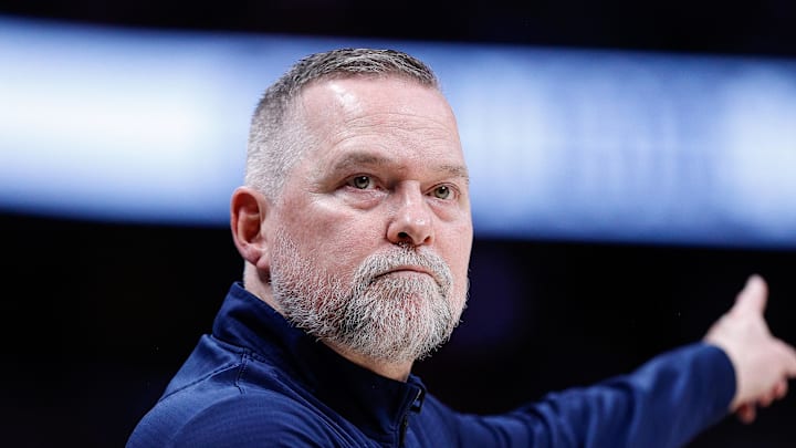 Apr 1, 2025; Denver, Colorado, USA; Denver Nuggets head coach Michael Malone in the second quarter against the Minnesota Timberwolves at Ball Arena. Mandatory Credit: Isaiah J. Downing-Imagn Images