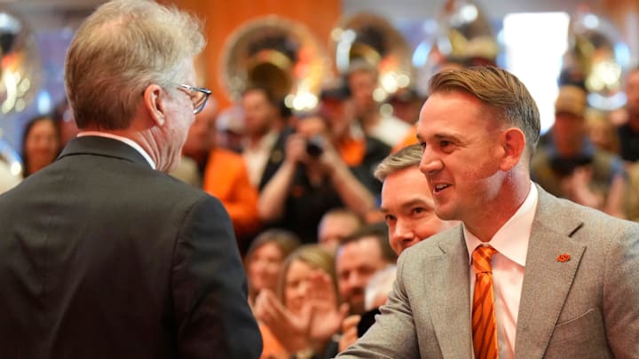 Eric Morris is welcomed by OSU President Dr. Jim Hess. Oklahoma State University (OSU) introduces the new head football coach, Eric Morris, during a rally , Monday, Dec. 8, 2025.