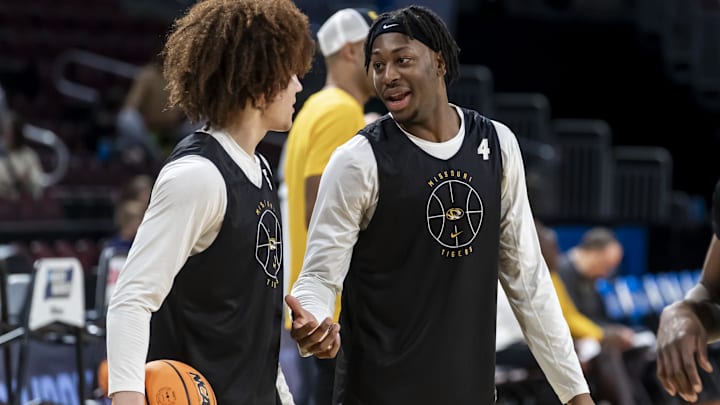 Mar 19, 2025; Wichita, KS, USA; Missouri Tigers guard Marcus Allen (4) interacts with teammate guard T.O. Barrett (5) during a practice session at Intrust Bank Arena. Mandatory Credit: Nick Tre. Smith-Imagn Images Mar 19, 2025; Wichita, KS, USA; Missouri Tigers guard Marcus Allen (4) interacts with teammate guard T.O. Barrett (5) during a practice session at Intrust Bank Arena. Mandatory Credit: Nick Tre. Smith-Imagn Images