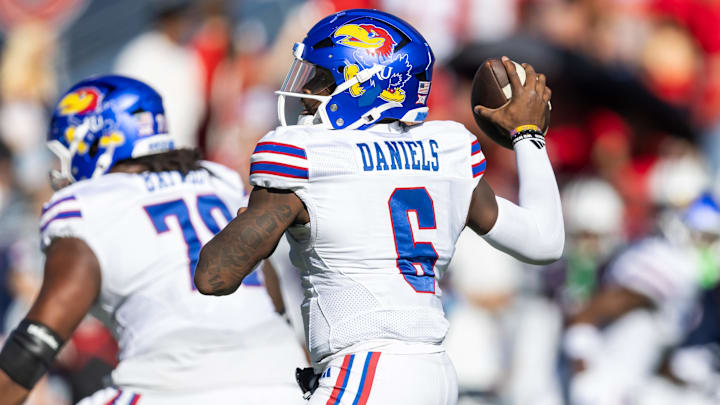 Nov 8, 2025; Tucson, Arizona, USA; Kansas Jayhawks quarterback Jalon Daniels (6) against the Arizona Wildcats at Arizona Stadium. Mandatory Credit: Mark J. Rebilas-Imagn Images