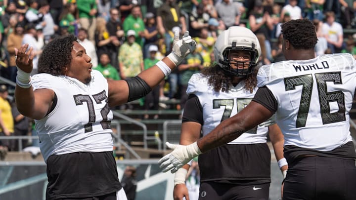 Iapani Laloulu, left, Lipe Moala and Isaiah World know the Oregon two-deep is something to "Shout" about.