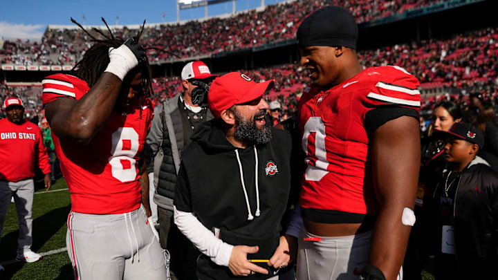 Ohio State Buckeyes defensive coordinator Matt Patricia celebrates with Ohio State Buckeyes linebacker Sonny Styles (0) and linebacker Arvell Reese (8) following the NCAA football game against the Penn State Nittany Lions at Ohio Stadium in Columbus on Nov. 1, 2025.