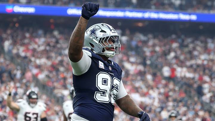 Dallas Cowboys defensive tackle Quinnen Williams reacts after a defensive play against the Houston Texans. Dallas Cowboys defensive tackle Quinnen Williams reacts after a defensive play against the Houston Texans.