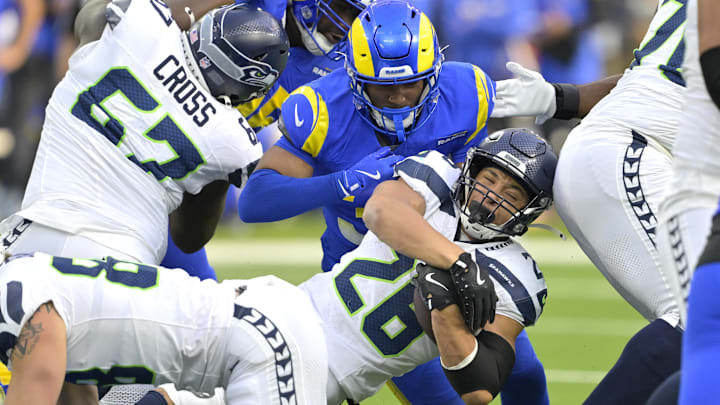Jan 5, 2025; Inglewood, California, USA; Seattle Seahawks running back Zach Charbonnet (26) gains a first down in the first half against the against the Los Angeles Rams at SoFi Stadium. Mandatory Credit: Jayne Kamin-Oncea-Imagn Images Jan 5, 2025; Inglewood, California, USA; Seattle Seahawks running back Zach Charbonnet (26) gains a first down in the first half against the against the Los Angeles Rams at SoFi Stadium. Mandatory Credit: Jayne Kamin-Oncea-Imagn Images