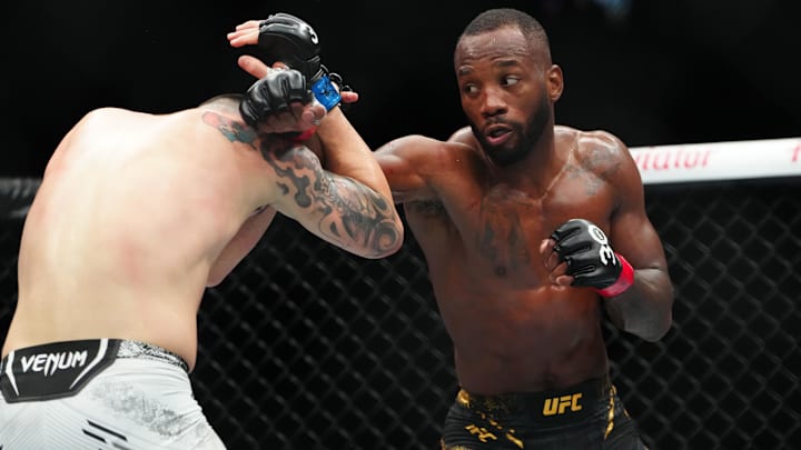 Dec 16, 2023; Las Vegas, Nevada, USA; Leon Edwards (red gloves) fights Colby Covington (blue gloves)
