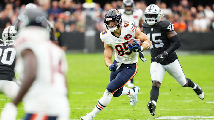 Cole Kmet looks for daylight after a reception Sunday against the Raiders. Cole Kmet looks for daylight after a reception Sunday against the Raiders.