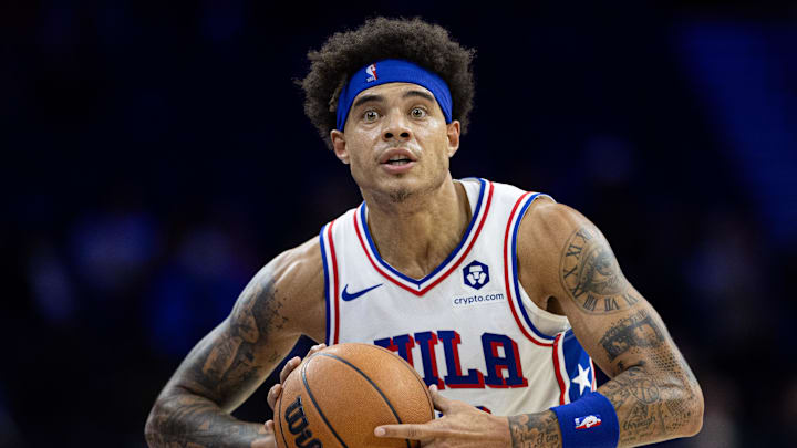 Oct 16, 2024; Philadelphia, Pennsylvania, USA; Philadelphia 76ers guard Lester Quinones (25) passes the ball against the Brooklyn Nets during the fourth quarter at Wells Fargo Center. Mandatory Credit: Bill Streicher-Imagn Images