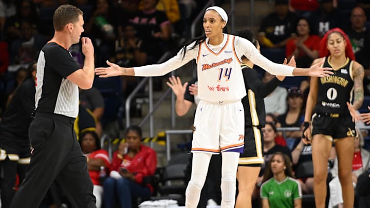 Sep 4, 2025; Washington, District of Columbia, USA;  Phoenix Mercury forward DeWanna Bonner (14) complains about a foul call against the Washington Mystics during the first quarter at CareFirst Arena. Mandatory Credit: Rafael Suanes-Imagn Images