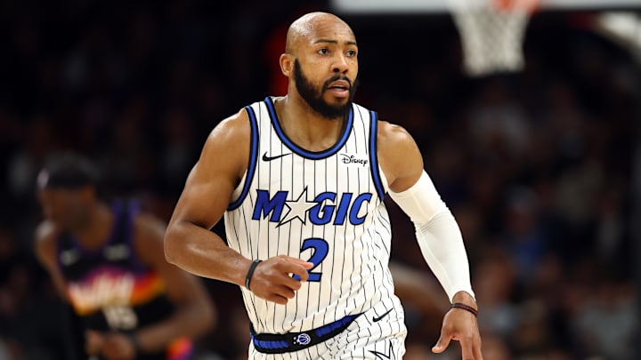 Feb 21, 2026; Phoenix, Arizona, USA; Orlando Magic guard Jevon Carter (2) against the Phoenix Suns at Mortgage Matchup Center. Mandatory Credit: Mark J. Rebilas-Imagn Images